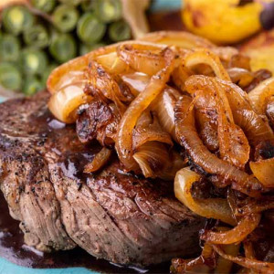 T Bone Steak with Caramelised Onions